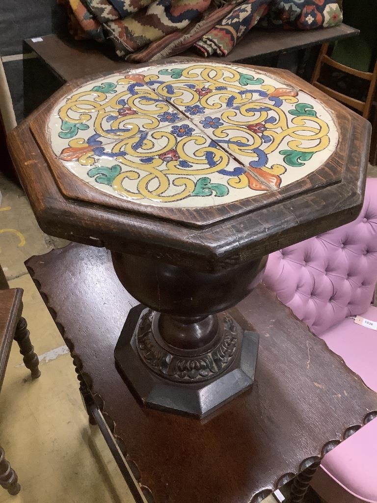 A Victorian Aesthetic movement carved oak hall seat, another carved oak chair, a tile top occasional table and a rectangular occasional table